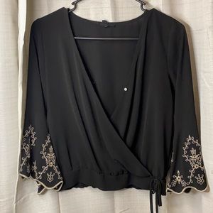 Small floral sleeve black blouse